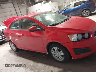 2014 Chevrolet Sonic LT with VIN 1G1JC5SH2E4214489, listed as a IAAI auction lot 41650289 with 93,388 mi miles and . Bid and sale history available at DreamBid. Image 13.
