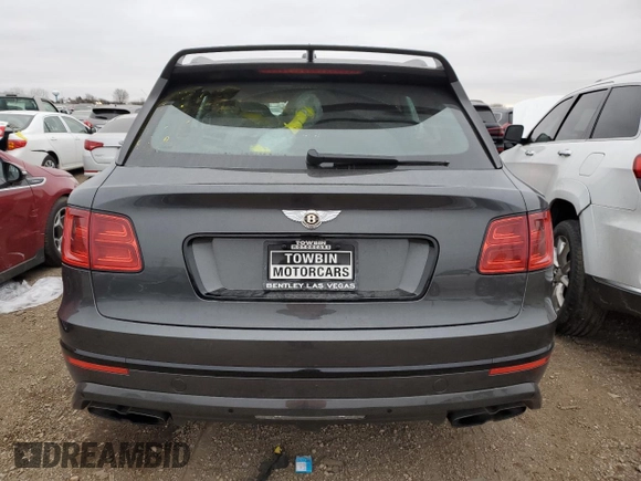 2019 Bentley Bentayga V8 z VIN SJAAM2ZV3KC027120, wystawiony jako Copart lot #83595274 z przebiegiem 28 972 mil mil oraz Szkoda całkowita • Salvage title. Historia ofert i sprzedaży dostępna na DreamBid. Obrazek 6.