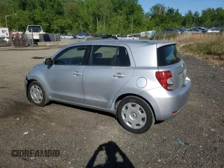 2008 Scion xD z VIN JTKKU10408J025968, wystawiony jako Copart lot #54627355 z przebiegiem 144 133 mil mil oraz Szkoda całkowita • Salvage title. Historia ofert i sprzedaży dostępna na DreamBid. Obrazek 2.