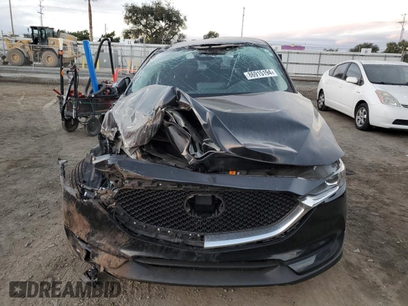 2021 Mazda CX-5 Sport with VIN JM3KFABM3M1334284, listed as a Copart auction lot 86915194 with 0 mi miles and Salvage Title. Bid and sale history available at carsss.com. Image 5.