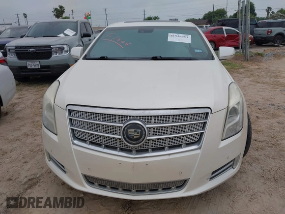 2013 Cadillac XTS Platinum z VIN 2G61U5S3XD9208737, wystawiony jako IAAI lot #41928451 z przebiegiem 167 984 mil mil oraz . Historia ofert i sprzedaży dostępna na DreamBid. Obrazek 12.