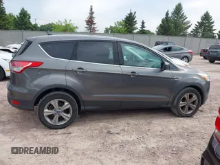 2013 Ford Escape SE with VIN 1FMCU0G96DUC26799, listed as a IAAI auction lot 42751599 with 116,312 mi miles and . Bid and sale history available at DreamBid. Image 14.