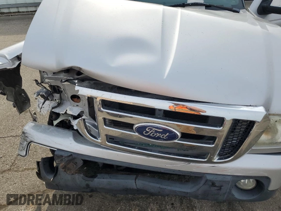 2010 Ford Ranger XLT with VIN 1FTKR4EE6APA01141, listed as a Copart auction lot 54953855 with 130,607 mi miles and Salvage title. Bid and sale history available at DreamBid. Image 11.