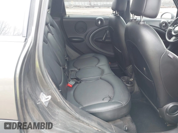 2014 MINI Countryman S with VIN WMWZC3C55EWT00349, listed as a IAAI auction lot 41738181 with 133,662 mi miles and . Bid and sale history available at DreamBid. Image 8.