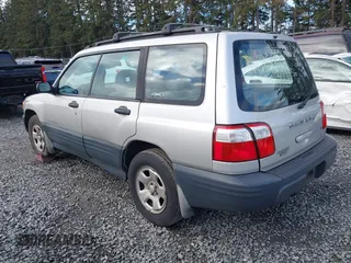 2001 Subaru Forester L with VIN JF1SF635X1H735028, listed as a IAAI auction lot 41805026 with 132,843 mi miles. Bid and sale history available at carsss.com. Image 3.