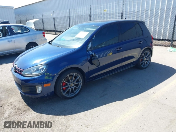 2011 Volkswagen GTI w/Sunroof & Navi PZEV z VIN WVWGD7AJ9BW104487, wystawiony jako IAAI lot #41702023 z przebiegiem 127 706 mil mil oraz . Historia ofert i sprzedaży dostępna na DreamBid. Obrazek 2.