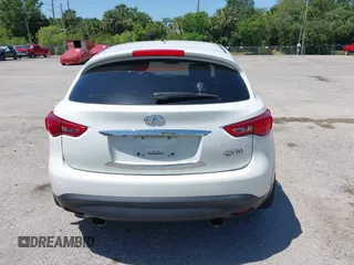 2014 Infiniti QX70 with VIN JN8CS1MU7EM451098, listed as a IAAI auction lot 42026803 with 126,605 mi miles and . Bid and sale history available at DreamBid. Image 16.