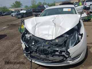 2016 Lincoln MKZ with VIN 3LN6L2G94GR633849, listed as a IAAI auction lot 42157808 with 118,678 mi miles and . Bid and sale history available at carsss.com. Image 13.