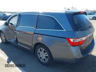 2011 Honda Odyssey EX-L with VIN 5FNRL5H60BB103430, listed as a IAAI auction lot 41752581 with 108,422 mi miles and . Bid and sale history available at carsss.com. Image 3.