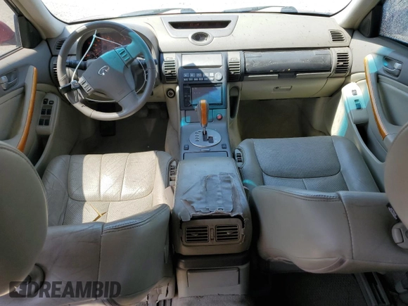 2003 Infiniti G35 w/Leather with VIN JNKCV51E63M019749, listed as a Copart auction lot 53346205 with 156,998 mi miles and Salvage Title. Bid and sale history available at DreamBid. Image 8.