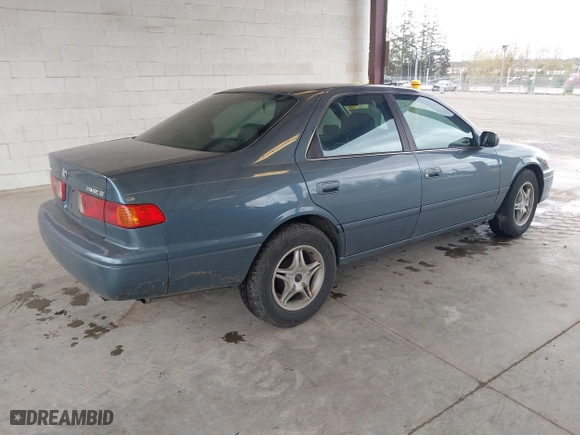 2000 Toyota Camry CE with VIN 4T1BG22KXYU923956, listed as a IAAI auction lot 41937950 with 101,539 mi miles. Bid and sale history available at carsss.com. Image 4.