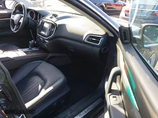 2014 Maserati Ghibli S Q4 with VIN ZAM57RTA2E1086046, listed as a IAAI auction lot 41846389 with 55,984 mi miles. Bid and sale history available at carsss.com. Image 5.