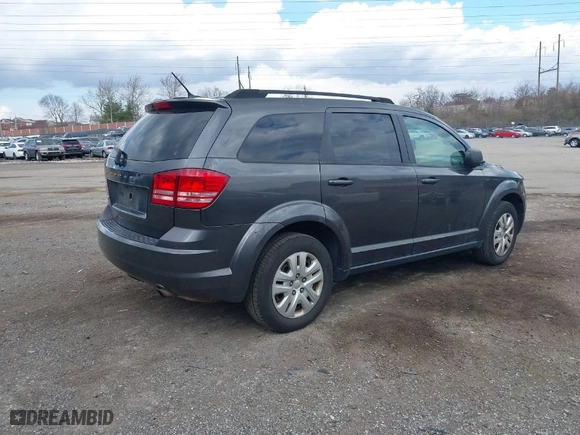 2017 Dodge Journey SE with VIN 3C4PDCAB2HT696945, listed as a IAAI auction lot 41884951 with NaN miles. Bid and sale history available at carsss.com. Image 4.