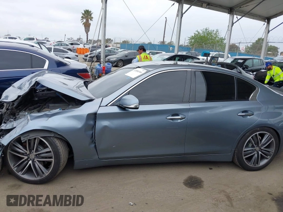 2015 Infiniti Q50 Premium with VIN JN1BV7AP1FM351633, listed as a IAAI auction lot 41880366 with 106,564 mi miles. Bid and sale history available at carsss.com. Image 15.