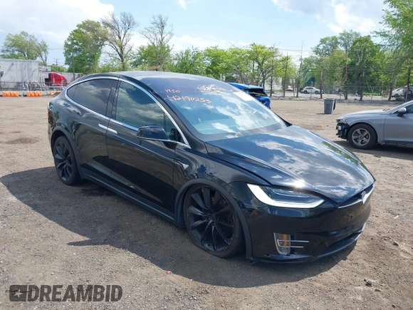 2019 Tesla Model X 75D with VIN 5YJXCBE21KF180203, listed as a IAAI auction lot 42190255 with 114,294 mi miles and . Bid and sale history available at DreamBid. Image 1.