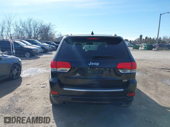 2014 Jeep Grand Cherokee Overland with VIN 1C4RJECG4EC523747, listed as a IAAI auction lot 40802143 with 124,079 mi miles. Bid and sale history available at carsss.com. Image 16.