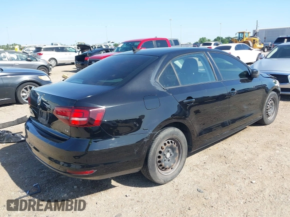 2016 Volkswagen Jetta Sedan 1.4T S w/Technology with VIN 3VW267AJ9GM205926, listed as a IAAI auction lot 42007360 with 142,018 mi miles. Bid and sale history available at carsss.com. Image 4.