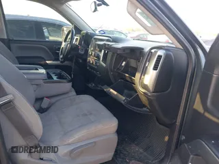 2018 Chevrolet Silverado 1500 LT with VIN 1GCRCREC9JZ105218, listed as a IAAI auction lot 40778682 with 124,621 mi miles and . Bid and sale history available at DreamBid. Image 5.