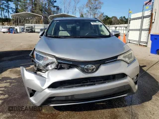 2018 Toyota RAV4 XLE with VIN JTMWFREV1JJ205906, listed as a Copart auction lot 84700564 with 64,953 mi miles and Salvage Title. Bid and sale history available at DreamBid. Image 5.