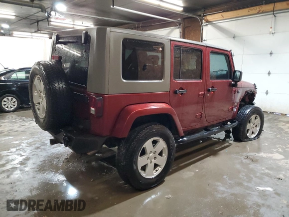 2007 Jeep Wrangler Unlimited Sahara with VIN 1J4GA59197L104784, listed as a Copart auction lot 56700205 with 156,382 mi miles and Salvage title. Bid and sale history available at DreamBid. Image 3.