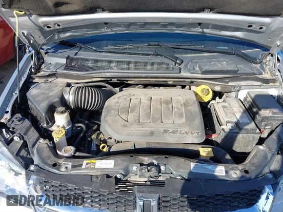 2020 Dodge Grand Caravan SE with VIN 2C4RDGBG9LR198425, listed as a IAAI auction lot 40672143 with 61,473 mi miles and . Bid and sale history available at DreamBid. Image 10.