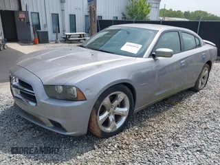 2014 Dodge Charger RT Plus with VIN 2C3CDXCT4EH220586, listed as a IAAI auction lot 42044918 with 199,304 mi miles. Bid and sale history available at carsss.com. Image 2.