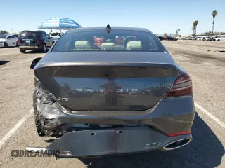 2024 Genesis G70 2.5T with VIN KMTG34SC9RU141502, listed as a Copart auction lot 50356715 with 2,595 mi miles and Salvage Title. Bid and sale history available at carsss.com. Image 6.