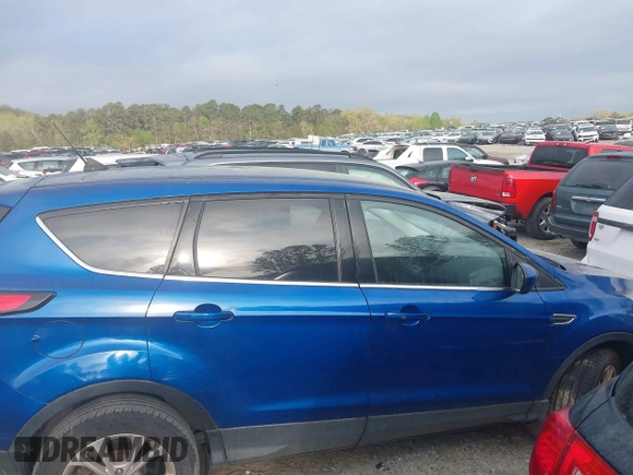 2019 Ford Escape SE z VIN 1FMCU9GD5KUA06575, wystawiony jako IAAI lot #41942726 z przebiegiem 85 290 mil mil oraz . Historia ofert i sprzedaży dostępna na DreamBid. Obrazek 13.