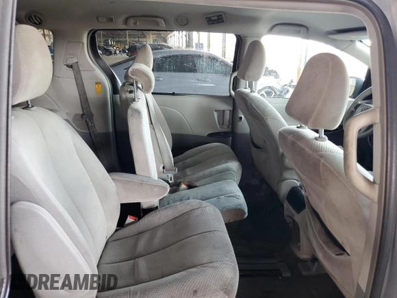 2014 Toyota Sienna LE AAS z VIN 5TDKK3DC6ES455092, wystawiony jako Copart lot #55516435 z przebiegiem 256 846 mil mil oraz Szkoda całkowita • Salvage title. Historia ofert i sprzedaży dostępna na DreamBid. Obrazek 11.