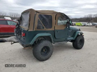 2000 Jeep Wrangler Sahara z VIN 1J4FA59S5YP803327, wystawiony jako Copart lot #44382505 z przebiegiem Nie podano mil oraz Szkoda całkowita • Salvage title. Historia ofert i sprzedaży dostępna na DreamBid. Obrazek 3.