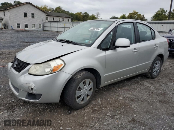 2009 Suzuki SX4 Man FWD with VIN JS2YC412396201554, listed as a Copart auction lot 72902194 with 135,355 mi miles and Salvage Title. Bid and sale history available at carsss.com. Image 1.