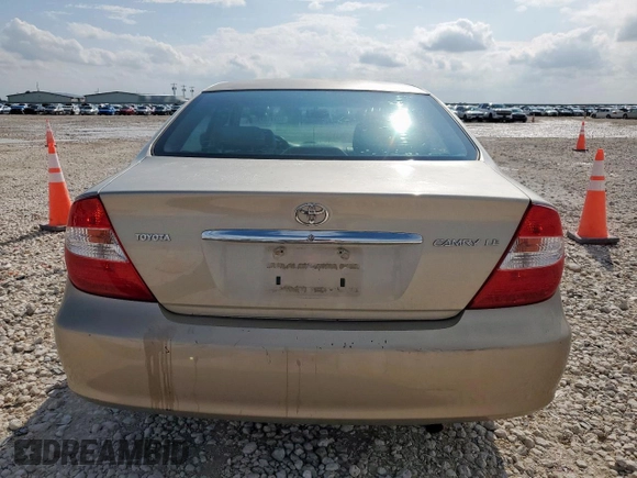 2004 Toyota Camry LE with VIN 4T1BE32K14U329066, listed as a Copart auction lot 60711515 with 178,144 mi miles and Salvage title. Bid and sale history available at DreamBid. Image 6.