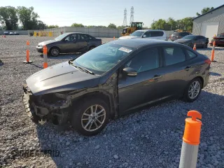 2016 Ford Focus SE with VIN 1FADP3F21GL252233, listed as a Copart auction lot 63280795 with 106,834 mi miles and Salvage title. Bid and sale history available at DreamBid. Image 1.