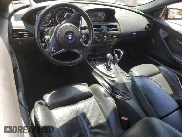 2009 BMW 6 Series 650i z VIN WBAEA535X9CV92734, wystawiony jako Copart lot #52678395 z przebiegiem 237 588 mil mil oraz Czysty tytuł • Clean title. Historia ofert i sprzedaży dostępna na DreamBid. Obrazek 8.