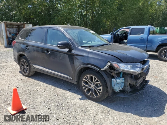 2018 Mitsubishi Outlander ES with VIN JA4AZ3A36JZ041387, listed as a Copart auction lot 65187715 with 132,876 mi miles and Salvage title. Bid and sale history available at DreamBid. Image 4.