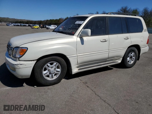 2000 Lexus LX 470 z VIN JT6HT00W1Y0096061, wystawiony jako Copart lot #52499155 z przebiegiem 199 914 mil mil oraz Tytuł czysty. Historia ofert i sprzedaży dostępna na DreamBid. Obrazek 1.