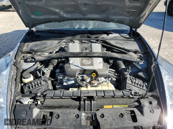 2014 Nissan 370Z Nismo with VIN JN1AZ4EH6EM633797, listed as a Copart auction lot 87879675 with 21,410 mi miles and Salvage Title. Bid and sale history available at DreamBid. Image 11.
