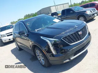 2019 Cadillac XT4 FWD Premium Luxury with VIN 1GYFZCR48KF141478, listed as a IAAI auction lot 41988092 with 53,970 mi miles. Bid and sale history available at carsss.com. Image 1.