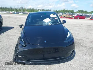 2024 Tesla Model Y z VIN 7SAYGDED6RF191135, wystawiony jako IAAI lot #41790922 z przebiegiem 17 154 mil mil oraz . Historia ofert i sprzedaży dostępna na DreamBid. Obrazek 12.