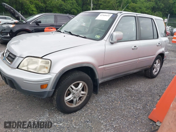 2001 Honda CR-V SE z VIN JHLRD18771C002009, wystawiony jako IAAI lot #42368432 z przebiegiem 257 664 mil mil oraz . Historia ofert i sprzedaży dostępna na DreamBid. Obrazek 2.
