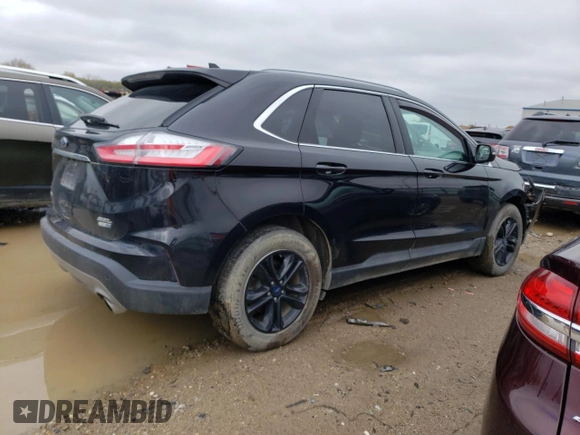 2020 Ford Edge SEL с VIN 2FMPK4J90LBA34676, выставлен на аукционе Copart как лот 55577665 с пробегом 113 214 миль миль и Списание • Salvage title. История ставок и продаж доступна на DreamBid. Изображение 3.