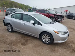 2012 Honda Civic LX z VIN 19XFB2F5XCE086383, wystawiony jako IAAI lot #42162315 z przebiegiem 80 390 mil mil oraz . Historia ofert i sprzedaży dostępna na DreamBid. Obrazek 1.