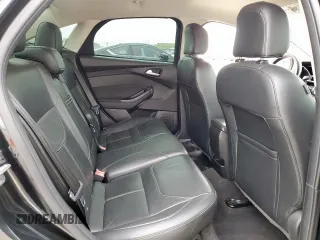 2015 Ford Focus SE z VIN 1FADP3F29FL357021, wystawiony jako Copart lot #57985125 z przebiegiem 142 786 mil mil oraz Szkoda całkowita • Salvage title. Historia ofert i sprzedaży dostępna na DreamBid. Obrazek 10.