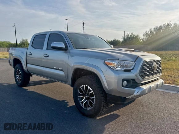 2023 Toyota Tacoma SR z VIN 3TMCZ5AN4PM566647, wystawiony jako Copart lot #60572355 z przebiegiem 43 666 mil mil oraz Czysty tytuł • Clean title. Historia ofert i sprzedaży dostępna na DreamBid. Obrazek 1.