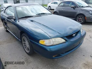 1996 Ford Mustang GT z VIN 1FALP42XXTF137304, wystawiony jako IAAI lot #42464808 z przebiegiem 166 565 mil mil oraz . Historia ofert i sprzedaży dostępna na DreamBid. Obrazek 1.