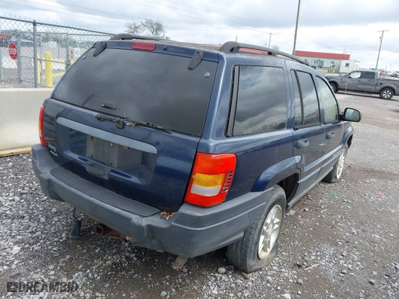 2003 Jeep Grand Cherokee Laredo with VIN 1J4GW48S63C591605, listed as a IAAI auction lot 41973681 with 177,024 mi miles. Bid and sale history available at carsss.com. Image 4.