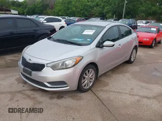 2014 Kia Forte LX with VIN KNAFX4A63E5099825, listed as a IAAI auction lot 42119316 with 174,551 mi miles and . Bid and sale history available at carsss.com. Image 2.