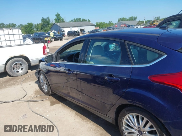 2016 Ford Focus Titanium with VIN 1FADP3N23GL231613, listed as a IAAI auction lot 42645683 with 76,072 mi miles and . Bid and sale history available at DreamBid. Image 15.