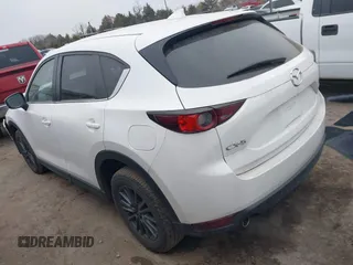 2021 Mazda CX-5 Touring with VIN JM3KFACM0M0412718, listed as a IAAI auction lot 41486753 with 41,496 mi miles. Bid and sale history available at carsss.com. Image 14.