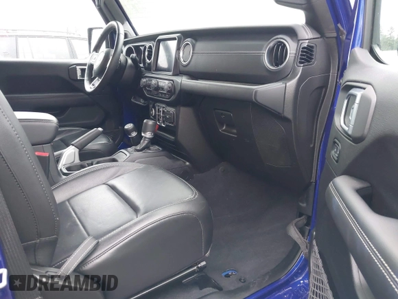 2019 Jeep Wrangler Unlimited Sahara with VIN 1C4HJXEG2KW609315, listed as a IAAI auction lot 41144404 with 55,266 mi miles and . Bid and sale history available at DreamBid. Image 5.